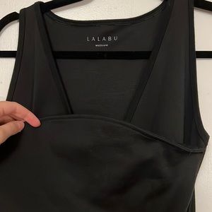 Lalabu baby wearing shirt.